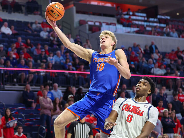 OXFORD, MISSISSIPPI - FEBRUARY 21: Thomas Haugh #10 of the Florida Gators shoots the ball against Malik Dia #0 of the Ole Miss Rebels during the first half at The Pavilion at Ole Miss on February 21, 2026 in Oxford, Mississippi.