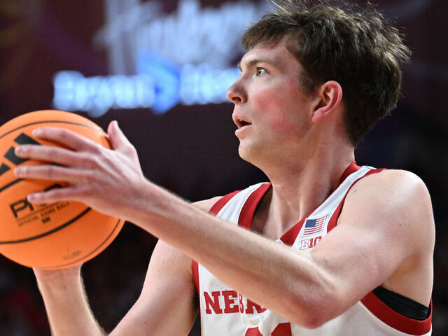 LINCOLN, NEBRASKA - FEBRUARY 21: Pryce Sandfort #21 of the Nebraska Cornhuskers attempts a three point shot against the Penn State Nittany Lions during the first half at Pinnacle Bank Arena on February 21, 2026 in Lincoln, Nebraska.