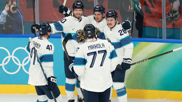 MILAN, ITALY - FEBRUARY 21: Erik Haula #56 of Team Finland celebrates scoring a goal with teammates during the second period in the Men's Bronze Medal match between Slovakia and Finland on day fifteen of the Milano Cortina 2026 Winter Olympic games at Milano Santagiulia Ice Hockey Arena on February 21, 2026 in Milan, Italy.