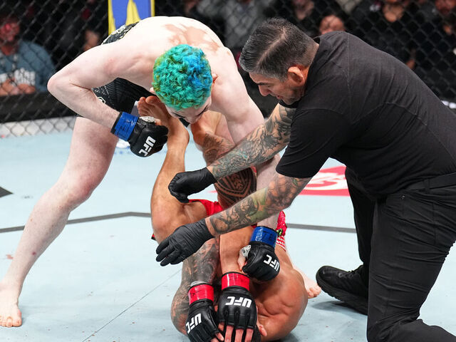 HOUSTON, TEXAS - FEBRUARY 21: Melquizael Costa of Brazil knocks out Dan Ige in a featherweight fight during the UFC Fight Night event at Toyota Center on February 21, 2026 in Houston, Texas.