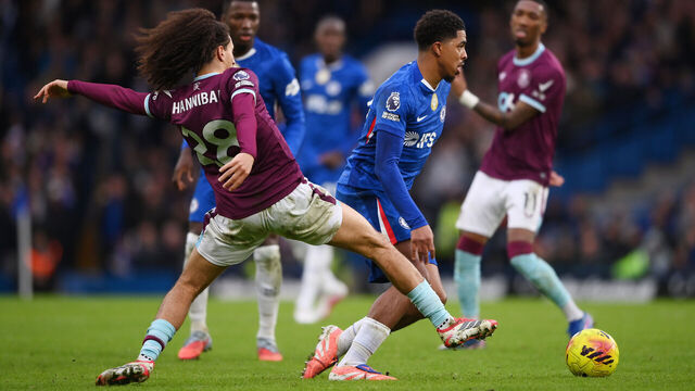 LONDON, ENGLAND - FEBRUARY 21: Wesley Fofana of Chelsea is challenged by Hannibal Mejbri of Burnley during the Premier League match between Chelsea and Burnley at Stamford Bridge on February 21, 2026 in London, England.