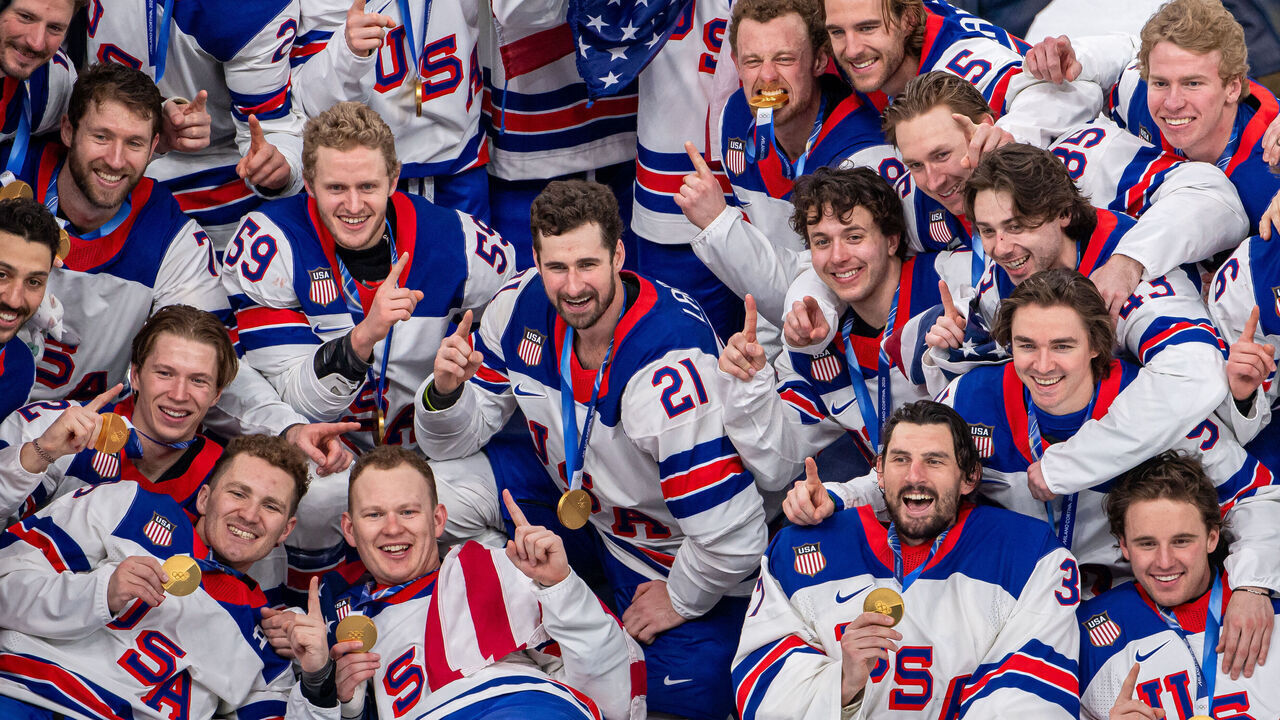 MILAN, ITALY - FEBRUARY 22: Team USA pose for group photo during the Men's Gold Medal match between Canada and United States on day sixteen of the Milano Cortina 2026 Winter Olympic games at Milano Santagiulia Ice Hockey Arena on February 22, 2026 in Milan, Italy.