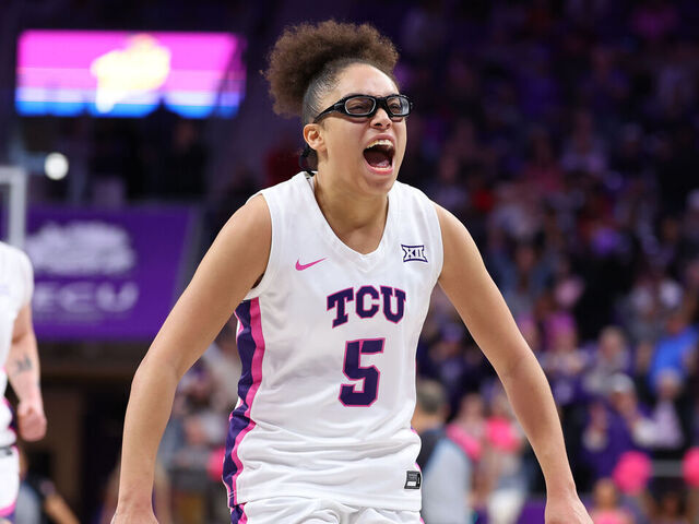 FORT WORTH, TEXAS - FEBRUARY 22: Olivia Miles #5 of the TCU Horned Frogs reacts after scoring during the fourth quarter against the Iowa State Cyclones at Schollmaier Arena on February 22, 2026 in Fort Worth, Texas.