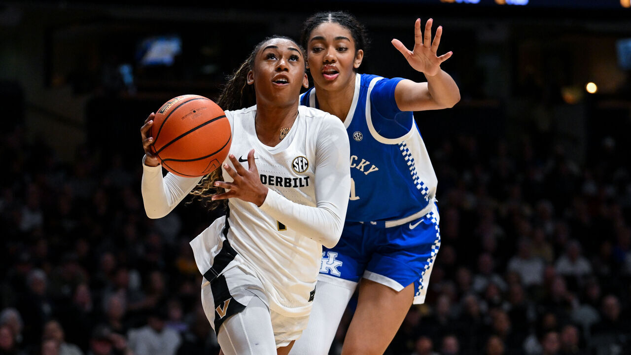 NASHVILLE, TENNESSEE - FEBRUARY 22: Mikayla Blakes #1 of the Vanderbilt Commodores drives towards the basket against Teonni Key #7 of the Kentucky Wildcats in the second half at Vanderbilt University Memorial Gymnasium on February 22, 2026 in Nashville, Tennessee.