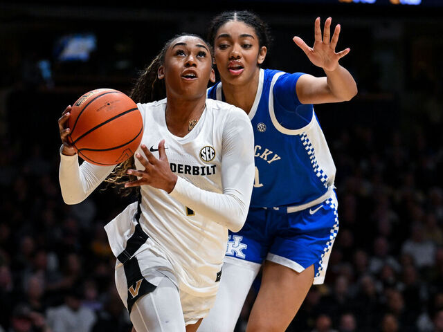 NASHVILLE, TENNESSEE - FEBRUARY 22: Mikayla Blakes #1 of the Vanderbilt Commodores drives towards the basket against Teonni Key #7 of the Kentucky Wildcats in the second half at Vanderbilt University Memorial Gymnasium on February 22, 2026 in Nashville, Tennessee.