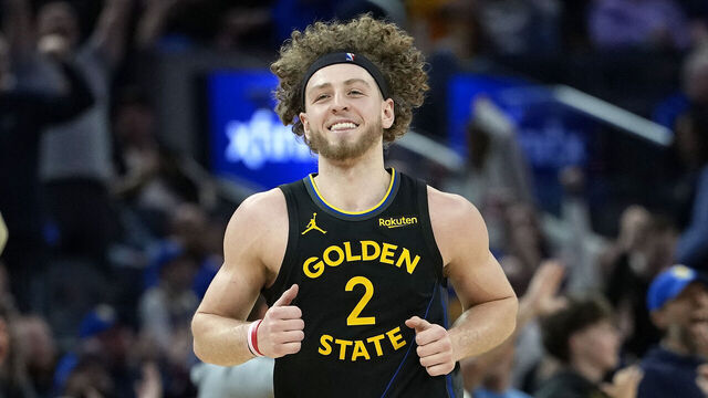 SAN FRANCISCO, CALIFORNIA - FEBRUARY 22: Brandin Podziemski #2 of the Golden State Warriors reacts after making a three-point shot against the Denver Nuggets in the second half at Chase Center on February 22, 2026 in San Francisco, California.