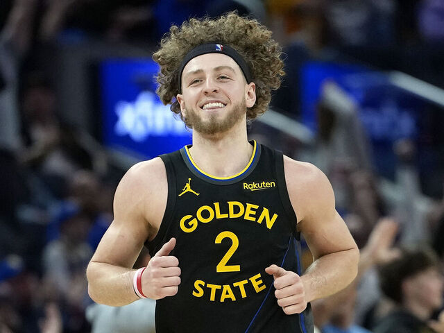 SAN FRANCISCO, CALIFORNIA - FEBRUARY 22: Brandin Podziemski #2 of the Golden State Warriors reacts after making a three-point shot against the Denver Nuggets in the second half at Chase Center on February 22, 2026 in San Francisco, California.