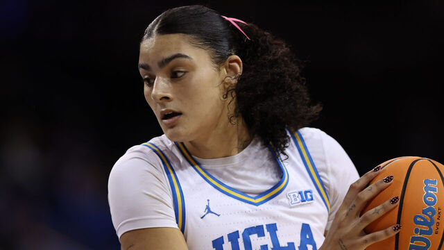 LOS ANGELES, CA - FEBRUARY 15: Lauren Betts #51 of the UCLA Bruins handles the ball in the first half of a women's college basketball game between the Indiana Hoosiers and the UCLA Bruins on February 15, 2026, at Pauley Pavilion in Los Angeles, California.