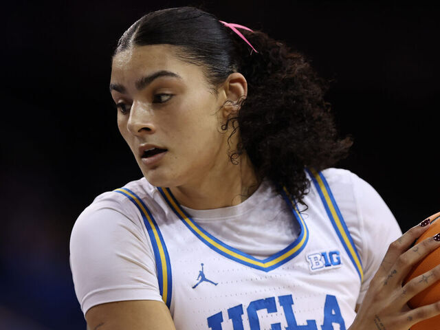 LOS ANGELES, CA - FEBRUARY 15: Lauren Betts #51 of the UCLA Bruins handles the ball in the first half of a women's college basketball game between the Indiana Hoosiers and the UCLA Bruins on February 15, 2026, at Pauley Pavilion in Los Angeles, California.