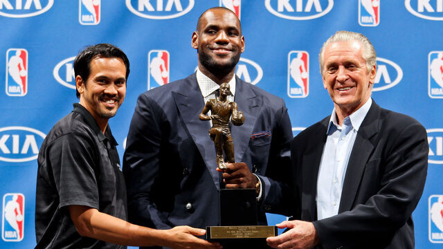 MIAMI, FL - MAY 5: LeBron James #6 of the Miami Heat, center, holds the Maurice Podoloff Trophy while posing with head coach Erik Spoelstra, left, and team president Pat Riley after being named the 2012-2013 Kia NBA Most Valuable Player (MVP) of the Year on May 5, 2013 at American Airlines Arena in Miami, Florida. Mandatory Copyright Notice: Copyright 2013 NBAE
