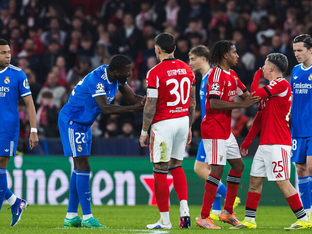 LISBON, PORTUGAL - 2026/02/17: Discussion between players (L to R), Kylian Mbappe of Real Madrid CF, Antonio Rudiger of Real Madrid CF, Nicolas Otamendi of SL Benfica, Leandro Barreiro of SL Benfica, Gianluca Prestianni of SL Benfica and Alvaro Carreras of Real Madrid CF during the UEFA Champions League 2025/26 Play-offs First Leg match between SL Benfica and Real Madrid CF at Estadio da Luz. Final score: SL Benfica 0 - 1 Real Madrid FC.