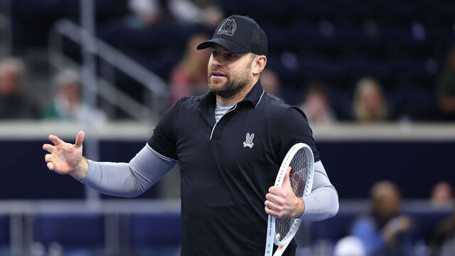 FRISCO, TEXAS - FEBRUARY 07: Andy Roddick of the United States talks before the All-American Classic against John Isner and John McEnroe of the United States during the 2026 Dallas Open at The Ford Center at The Star on February 07, 2026 in Frisco, Texas.