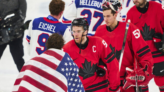 MILAN, ITALY - FEBRUARY 22: Connor McDavid of Canada handshake with Jack Hughes of Team United States after the Men`s Ice Hockey final match between USA and Canada on day sixteen of the Milano Cortina 2026 Winter Olympic games at Milano Santagiulia Ice Hockey Arena on February 22, 2026 in Milan, Italy.