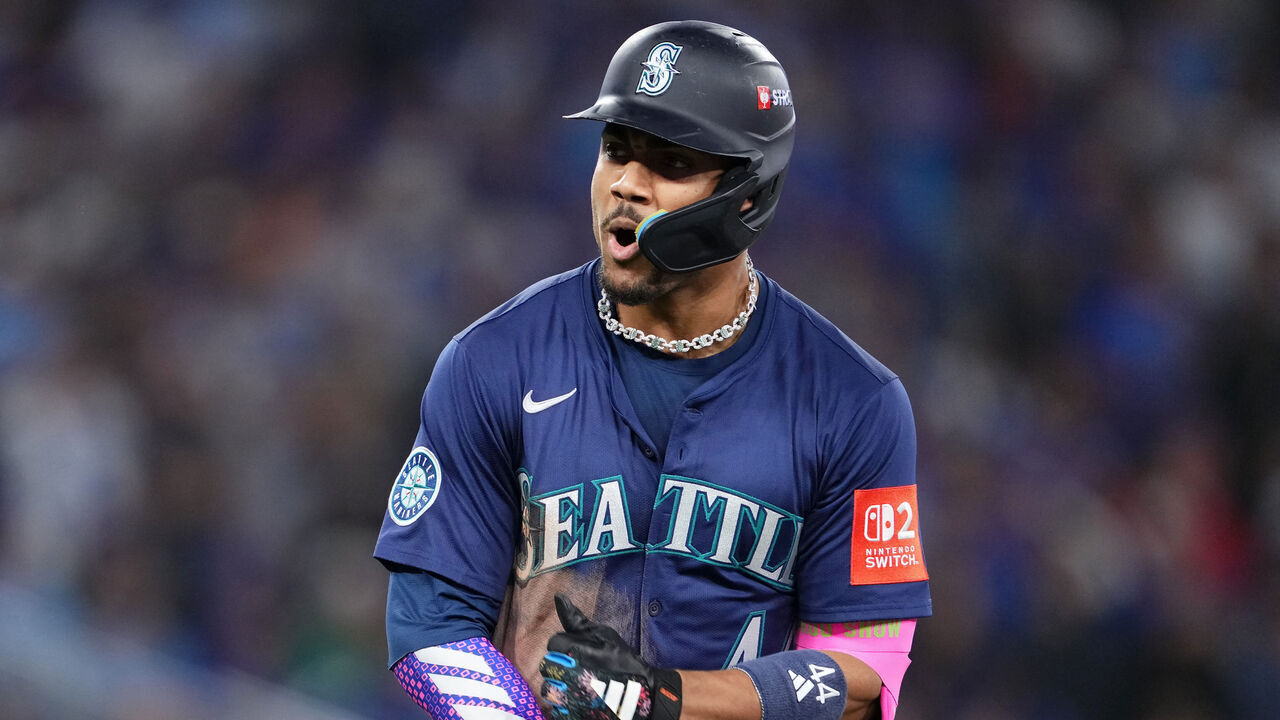 TORONTO, ONTARIO - OCTOBER 20: Julio Rodriguez #44 of the Seattle Mariners celebrates after hitting a home run against the Seattle Mariners during the third inning in game seven of the American League Championship Series at the Rogers Centre on October 20, 2025 in Toronto, Ontario.