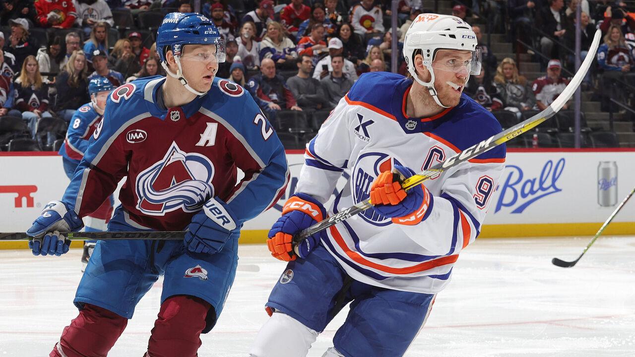 DENVER, COLORADO - JANUARY 16: Nathan MacKinnon #29 of the Colorado Avalanche skates against Connor McDavid #97 of the Edmonton Oilers at Ball Arena on January 16, 2025 in Denver, Colorado.