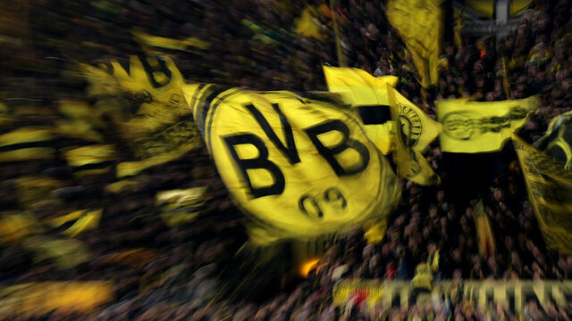 DORTMUND, GERMANY - FEBRUARY 17: Fans of Borussia Dortmund wave their flags during the UEFA Champions League 2025/26 League Knockout Play-off First Leg match between Borussia Dortmund and Atalanta BC at BVB Stadion Dortmund on February 17, 2026 in Dortmund, Germany.