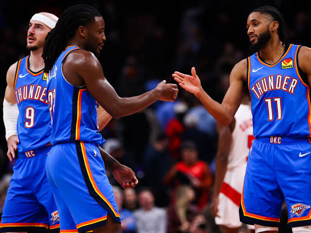TORONTO, CANADA - FEBRUARY 24: Cason Wallace #22 and Isaiah Joe #11 of the Oklahoma City Thunder celebrate at the end of their NBA game against the Toronto Raptors at Scotiabank Arena on February 24, 2026 in Toronto, Ontario, Canada.