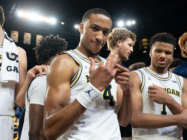 ANN ARBOR, MICHIGAN - FEBRUARY 24: Nimari Burnett #4 of the Michigan Wolverines reacts after Michigan defeated the Minnesota Golden Gophers 77-67 at Crisler Arena on February 24, 2026 in Ann Arbor, Michigan. Michigan secured a piece of the Big Ten Regular Season Title with the victory.