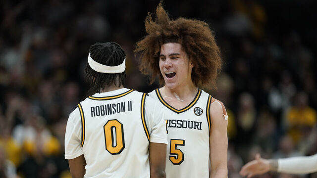 COLUMBIA, MISSOURI - FEBRUARY 24: T.O. Barrett #5 and Anthony Robinson II #0 of the Missouri Tigers celebrate after a 73-69 win over the Tennessee Volunteers at Mizzou Arena on February 24, 2026 in Columbia, Missouri.
