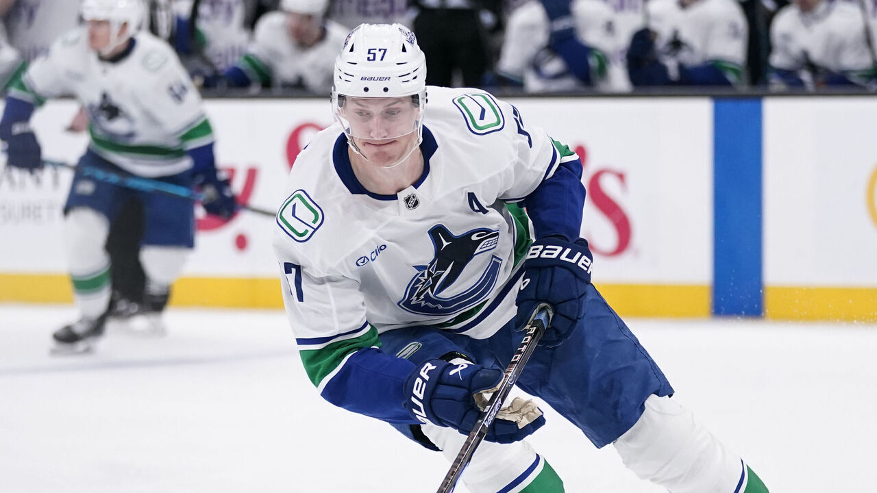SALT LAKE CITY, UT - FEBRUARY 02: Tyler Myers #57 of the Vancouver Canucks controls the puck during an NHL game between the Vancouver Canucks and the Utah Mammoth on February 2, 2026 at the Delta Center in Salt Lake City, UT.