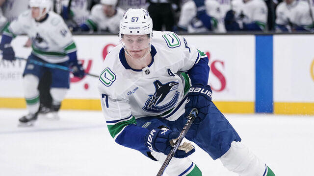 SALT LAKE CITY, UT - FEBRUARY 02: Tyler Myers #57 of the Vancouver Canucks controls the puck during an NHL game between the Vancouver Canucks and the Utah Mammoth on February 2, 2026 at the Delta Center in Salt Lake City, UT.