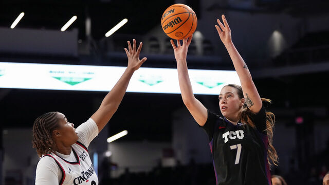 CINCINNATI, OHIO - FEBRUARY 25: Marta Suarez #7 of the TCU Horned Frogs attempts a shot while being guarded by Joya Crawford #8 of the Cincinnati Bearcats in the first quarter at Fifth Third Arena on February 25, 2026 in Cincinnati, Ohio.