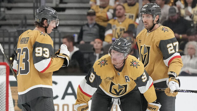 LAS VEGAS, NEVADA - OCTOBER 08: Mitch Marner #93, Jack Eichel #9 and Shea Theodore #27 of the Vegas Golden Knights wait for a faceoff against the Los Angeles Kings \i2p at T-Mobile Arena on October 08, 2025 in Las Vegas, Nevada. The Kings defeated the Golden Knights 6-5 in a shootout.