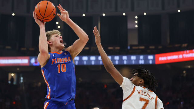 AUSTIN, TX - FEBRUARY 25: Forward Thomas Haugh #10 of the Florida Gators takes a shot over guard Simeon Wilcher #7 of the Texas Longhorns during the SEC college basketball game between Texas Longhorns and Florida Gators on February 25, 2026, at Moody Center in Austin, TX.