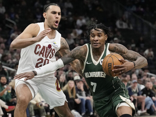MILWAUKEE, WISCONSIN - FEBRUARY 25: Kevin Porter Jr. #7 of the Milwaukee Bucks dribbles the ball against Jaylon Tyson #20 of the Cleveland Cavaliers during the fourth quarter at Fiserv Forum on February 25, 2026 in Milwaukee, Wisconsin.