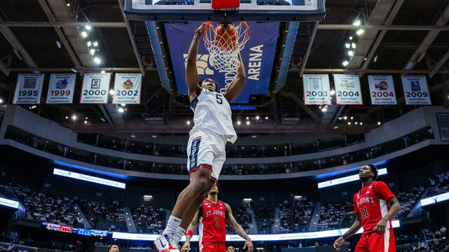 HARTFORD, CONNECTICUT - FEBRUARY 25: Tarris Reed Jr. #5 of the Connecticut Huskies gets the dunk against the St. John's Red Storm during the first half of an NCAA men's basketball game at PeoplesBank Arena on February 25, 2026 in Hartford, Connecticut.