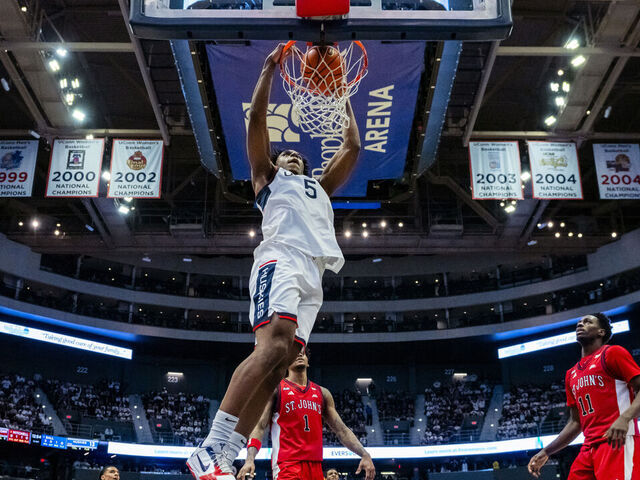 HARTFORD, CONNECTICUT - FEBRUARY 25: Tarris Reed Jr. #5 of the Connecticut Huskies gets the dunk against the St. John's Red Storm during the first half of an NCAA men's basketball game at PeoplesBank Arena on February 25, 2026 in Hartford, Connecticut.