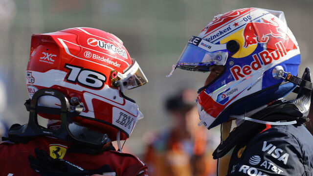 Ferrari driver Charles Leclerc (2nd place) and Red Bull driver Max Verstappen (3rd place) participate in the awards ceremony for the 2025 Mexican Grand Prix at the Autodromo Hnos. Rodriguez in Mexico City, Mexico, on October 26, 2025.