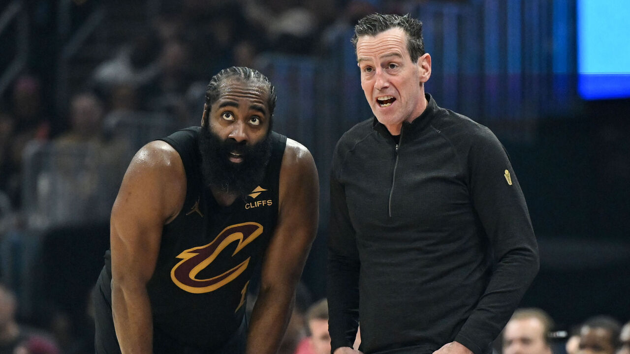 CLEVELAND, OHIO - FEBRUARY 19: Head coach Kenny Atkinson of the Cleveland Cavaliers talks with James Harden #1 during the second half against the Brooklyn Nets at Rocket Arena on February 19, 2026 in Cleveland, Ohio.
