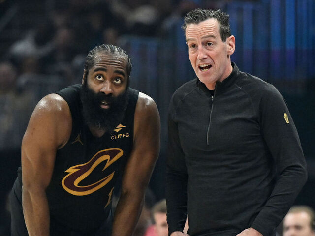 CLEVELAND, OHIO - FEBRUARY 19: Head coach Kenny Atkinson of the Cleveland Cavaliers talks with James Harden #1 during the second half against the Brooklyn Nets at Rocket Arena on February 19, 2026 in Cleveland, Ohio.