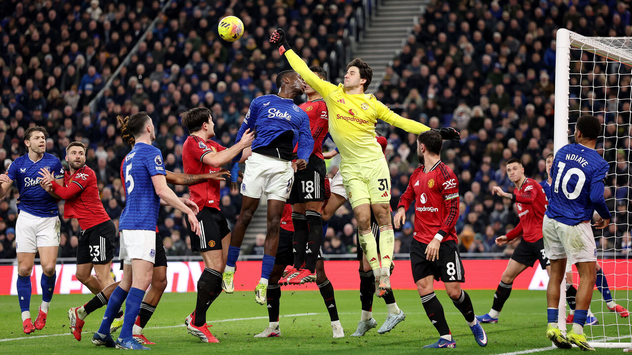 LIVERPOOL, ENGLAND - FEBRUARY 23: Senne Lammens of Manchester United makes a save whilst under pressure from Thierno Barry of Everton during the Premier League match between Everton and Manchester United at the Hill Dickinson Stadium on February 23, 2026 in Liverpool, England.