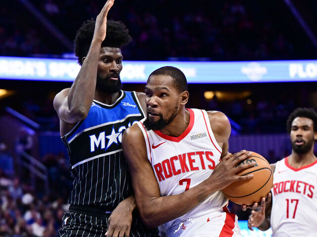 ORLANDO, FLORIDA - FEBRUARY 26: Kevin Durant #7 of the Houston Rockets goes to the basket against Jonathan Isaac #1 of the Orlando Magic during the second half of the game at Kia Center on February 26, 2026 in Orlando, Florida.