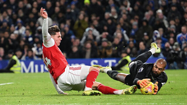 LONDON, ENGLAND - NOVEMBER 30: Viktor Gyokeres of Arsenal challenges Robert Sanchez of Chelsea during the Premier League match between Chelsea and Arsenal at Stamford Bridge on November 30, 2025 in London, England.