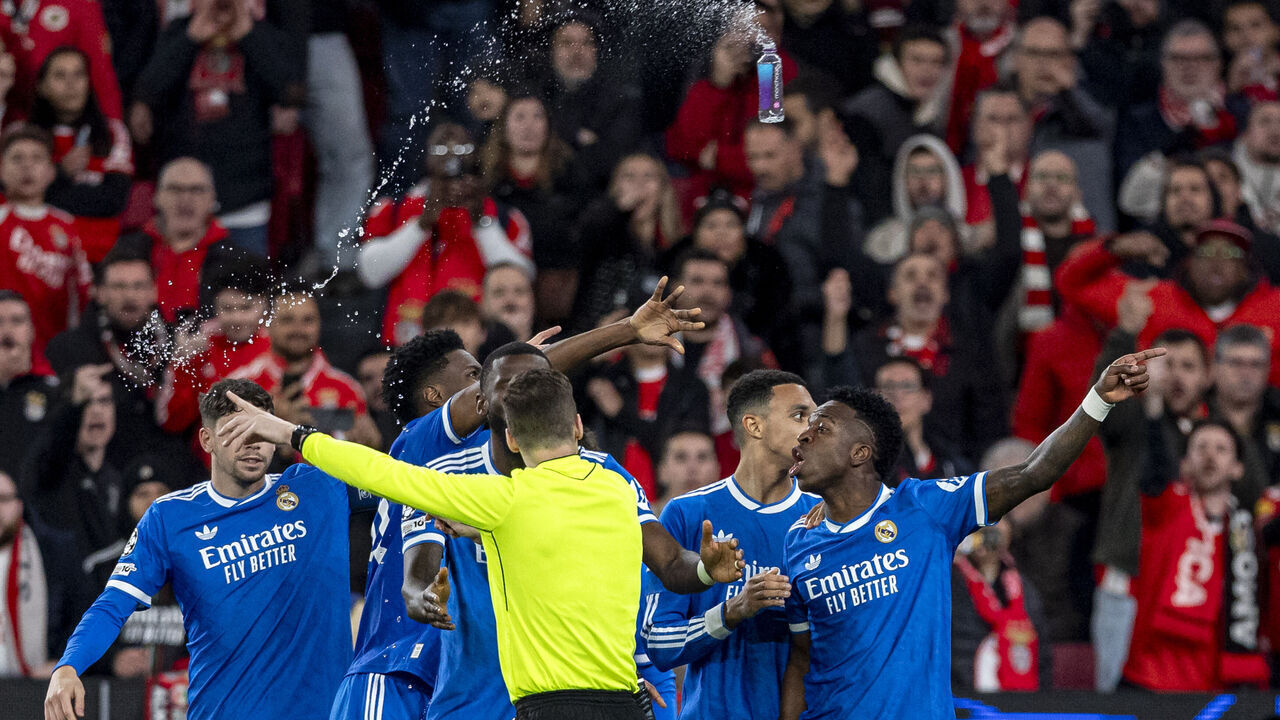 LISBON, PORTUGAL - FEBRUARY 17: Vinícius Júnior of Real Madrid C.F. reacts to racist abuse from fans during the UEFA Champions League 2025/26 League Knockout Play-off First Leg match between SL Benfica and Real Madrid C.F. at Estadio do SL Benfica on February 17, 2026 in Lisbon, Portugal.