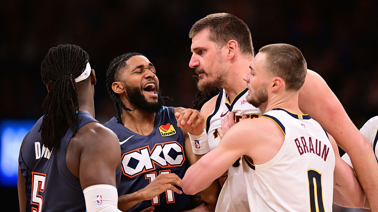 OKLAHOMA CITY, OKLAHOMA - FEBRUARY 27: Isaiah Joe #11 of the Oklahoma City Thunder gets in between Luguentz Dort #5 of the Oklahoma City Thunder and Nikola Jokic #15 of the Denver Nuggets during the second half at Paycom Center on February 27, 2026 in Oklahoma City, Oklahoma.