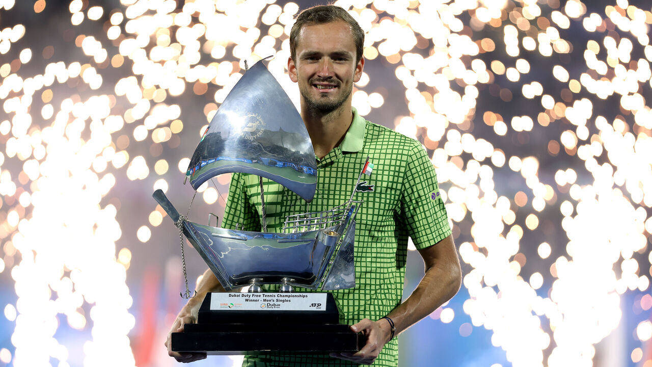 DUBAI, UNITED ARAB EMIRATES - FEBRUARY 28: Daniil Medvedev poses with the trophy during the presentation ceremony after his victory in the Men's Singles Final against Tallon Griekspoor of the Netherlands on day fourteen of the Dubai Duty Free Tennis Championships at Dubai Duty Free Tennis Stadium on February 28, 2026 in Dubai, United Arab Emirates.