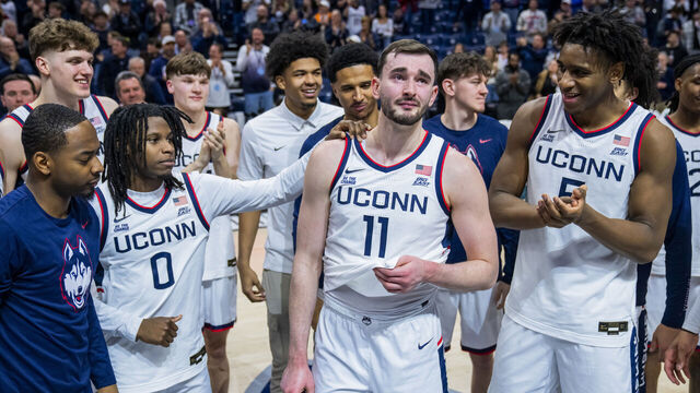 STORRS, CONNECTICUT - FEBRUARY 28: Alex Karaban #11 of the Connecticut Huskies speaks to the crowd following an NCAA men's basketball game against the Seton Hall Pirates at Harry A. Gampel Pavilion on February 28, 2026 in Storrs, Connecticut.
