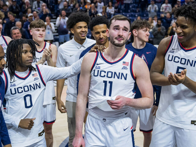 STORRS, CONNECTICUT - FEBRUARY 28: Alex Karaban #11 of the Connecticut Huskies speaks to the crowd following an NCAA men's basketball game against the Seton Hall Pirates at Harry A. Gampel Pavilion on February 28, 2026 in Storrs, Connecticut.