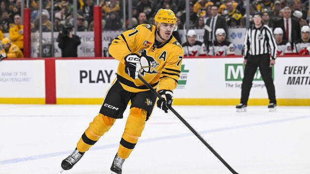 PITTSBURGH, PA - FEBRUARY 26: Pittsburgh Penguins center Evgeni Malkin (71) skates with the puck during the first period in the NHL game between the Pittsburgh Penguins and the New Jersey Devils on February 26, 2026, at PPG Paints Arena in Pittsburgh, PA.