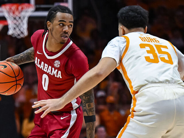 KNOXVILLE, TN - FEBRUARY 28: Alabama Crimson Tide guard Labaron Philon (0) controls the ball against Tennessee Volunteers guard Ethan Burg (35) during the college basketball game between the Tennessee Volunteers and the Alabama Crimson Tide on February 28, 2026, at Food City Center in Knoxville, TN.