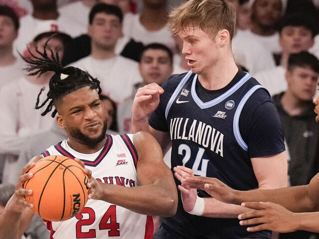 NEW YORK, NEW YORK - FEBRUARY 28: Zuby Ejiofor #24 of the St. John's Red Storm dribbles the ball against Duke Brennan #24 of the Villanova Wildcats in the first half of a college basketball game at Madison Square Garden on February 28, 2026 in New York City.