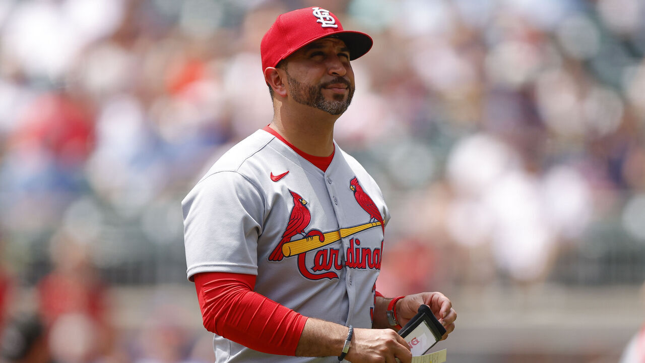 ATLANTA, GEORGIA - APRIL 23: Manager Oliver Marmol of the St. Louis Cardinals makes a pitching change during the seventh inning against the Atlanta Braves at Truist Park on April 23, 2025 in Atlanta, Georgia.