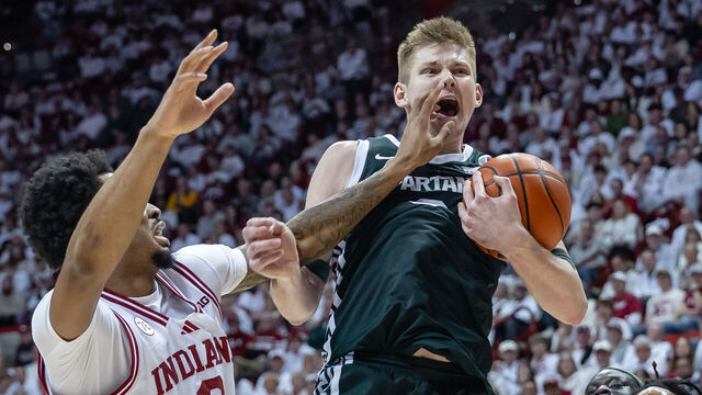 BLOOMINGTON, INDIANA - MARCH 1: Jaxon Kohler #0 of the Michigan State Spartans rebounds the ball against Jasai Miles #0 of the Indiana Hoosiers during the second half at Simon Skjodt Assembly Hall on March 1, 2026 in Bloomington, Indiana.