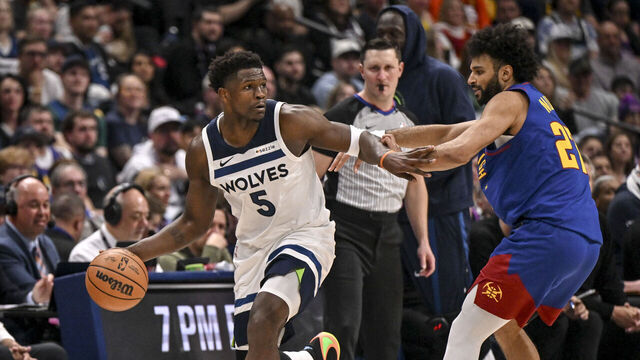 DENVER , CO - MARCH 1: Jamal Murray (27) of the Denver Nuggets defends Anthony Edwards (5) of the Minnesota Timberwolves during the third quarter at Ball Arena in Denver, Colorado on Sunday, March 1, 2026.