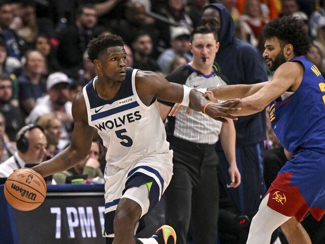 DENVER , CO - MARCH 1: Jamal Murray (27) of the Denver Nuggets defends Anthony Edwards (5) of the Minnesota Timberwolves during the third quarter at Ball Arena in Denver, Colorado on Sunday, March 1, 2026.