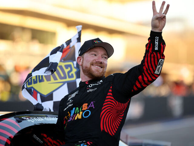 AUSTIN, TEXAS - MARCH 01: Tyler Reddick, driver of the #45 Chumba Casino Toyota, celebrates` after winning his third race in a row to start the 2026 NASCAR season winning the NASCAR Cup Series DuraMax Grand Prix Powered by RelaDyne at Circuit of The Americas on March 01, 2026 in Austin, Texas.